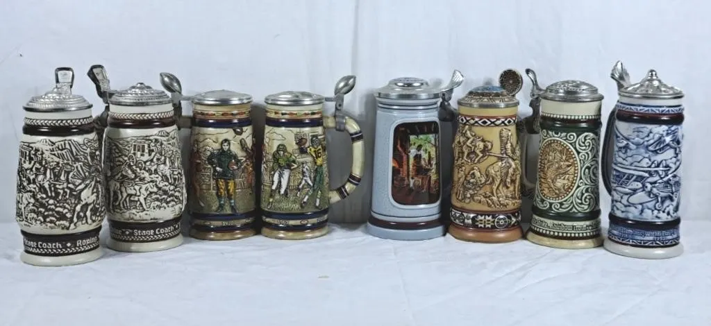 Lot of 8 steins. Pair of football and western.
