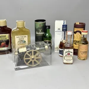 7 sample size bottles of alcohol