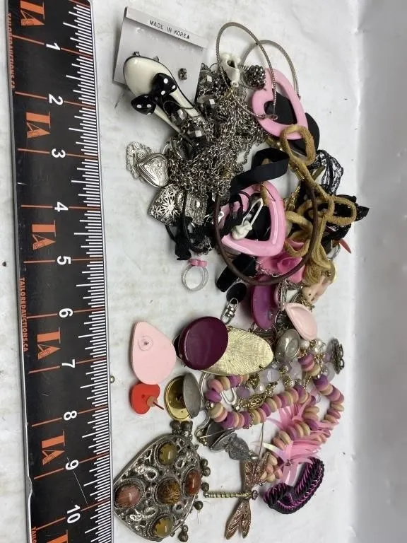 Assorted costume jewelry lot: necklaces, earrings,