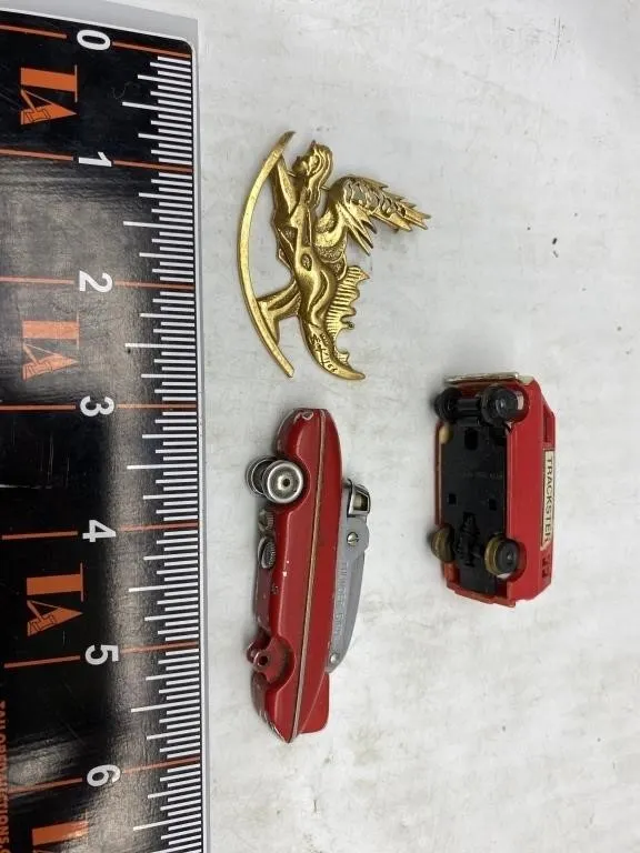 Gold-tone winged pin, Thunderbird lighter,