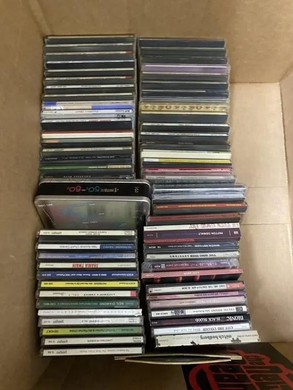 Large lot of assorted music CDs and cassette tapes