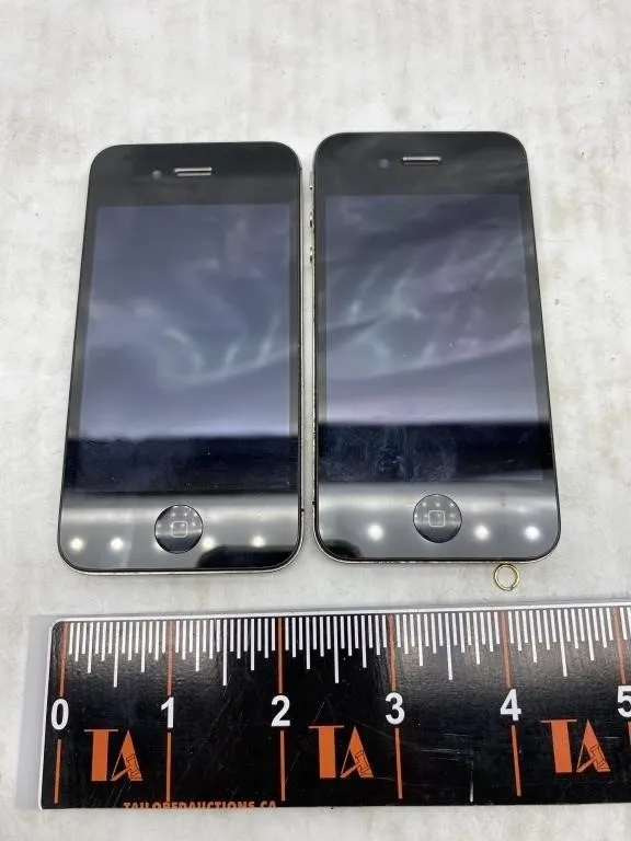 Two Apple iPhone 4/4S smartphones