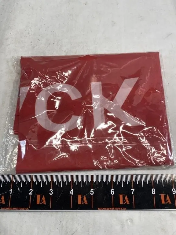 Red Fabric Item with 'CK' Logo, New in Packaging