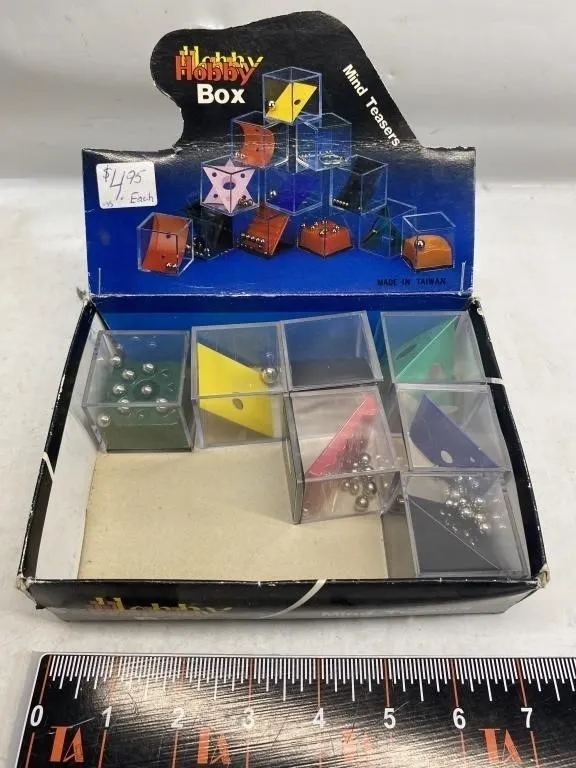 Hobby Box Mind Teasers display, 8 pyramid puzzles