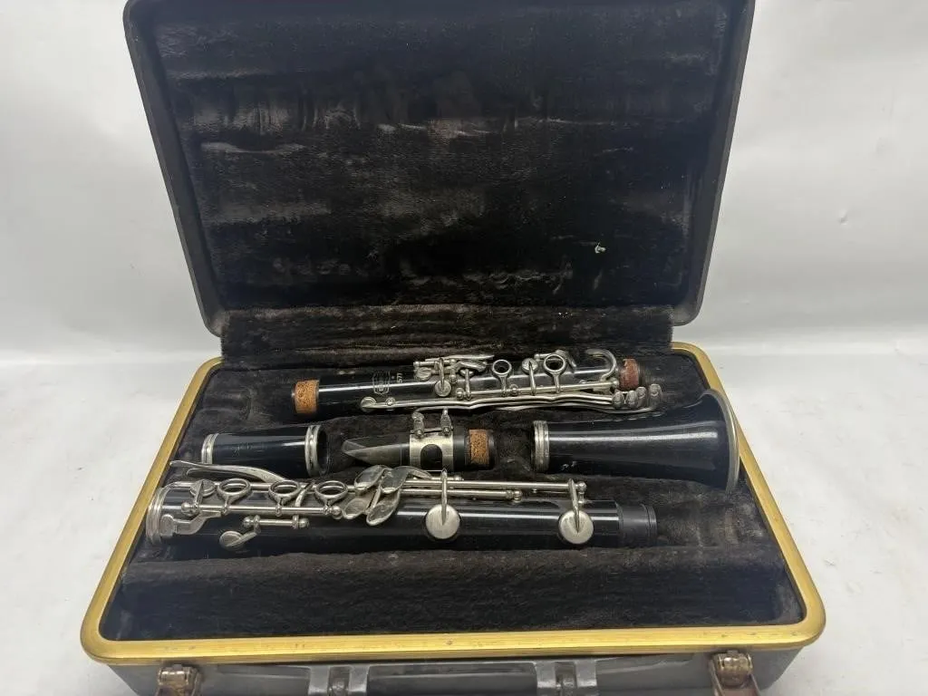 Bundy Clarinet in Case & Bart Simpson Skateboard