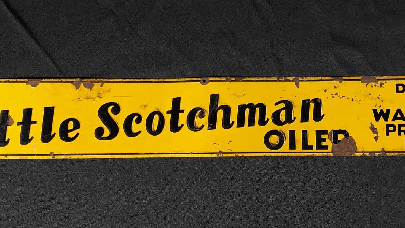 EMBOSSED TIN SIGN WE USE THE LITTLE SCOTCHMAN OILER WATKINS PRODUCTS DEALER