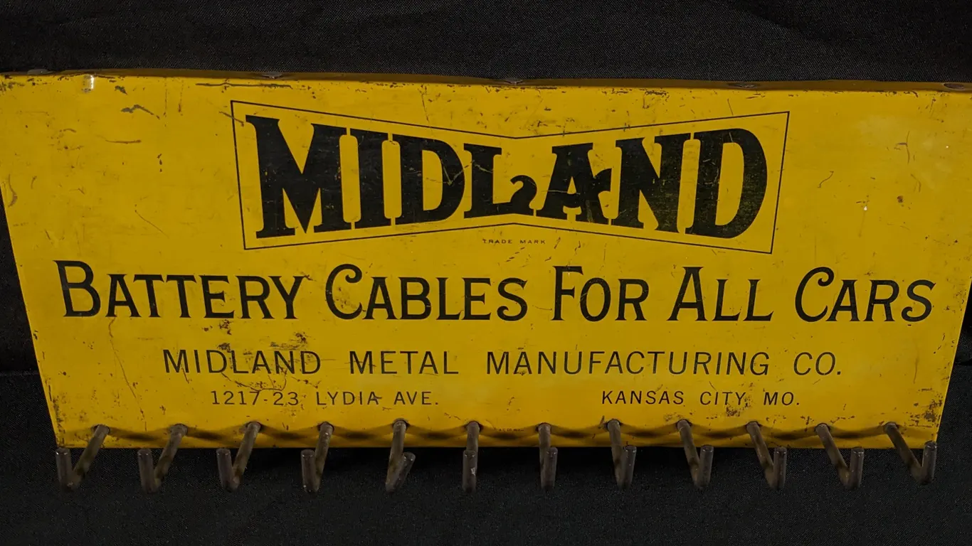 TIN BATTERY CABLE RACK SIGN MIDLAND CABLES FOR ALL CARS KANSAS CITY MO