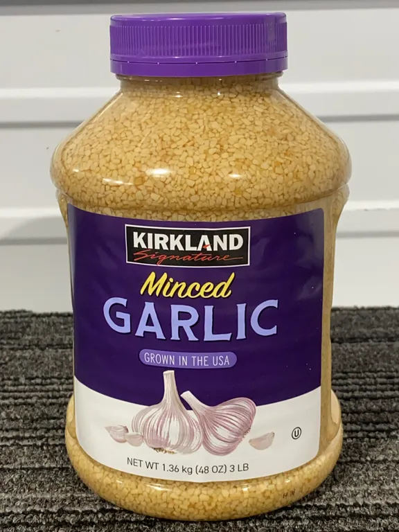 *NEW* Kirkland Signature, Minced California Garlic, 48 OZ - Best By: 8/2028