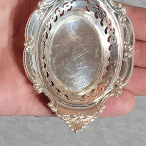 A pair of Gorham Sterling Silver reticulated nut or mint dishes. Each is marked Gorham Sterling 4780. Total weight is 48g. O
