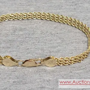 7 inch Gold Bracelet marked 14K. 6.6 grams. JB