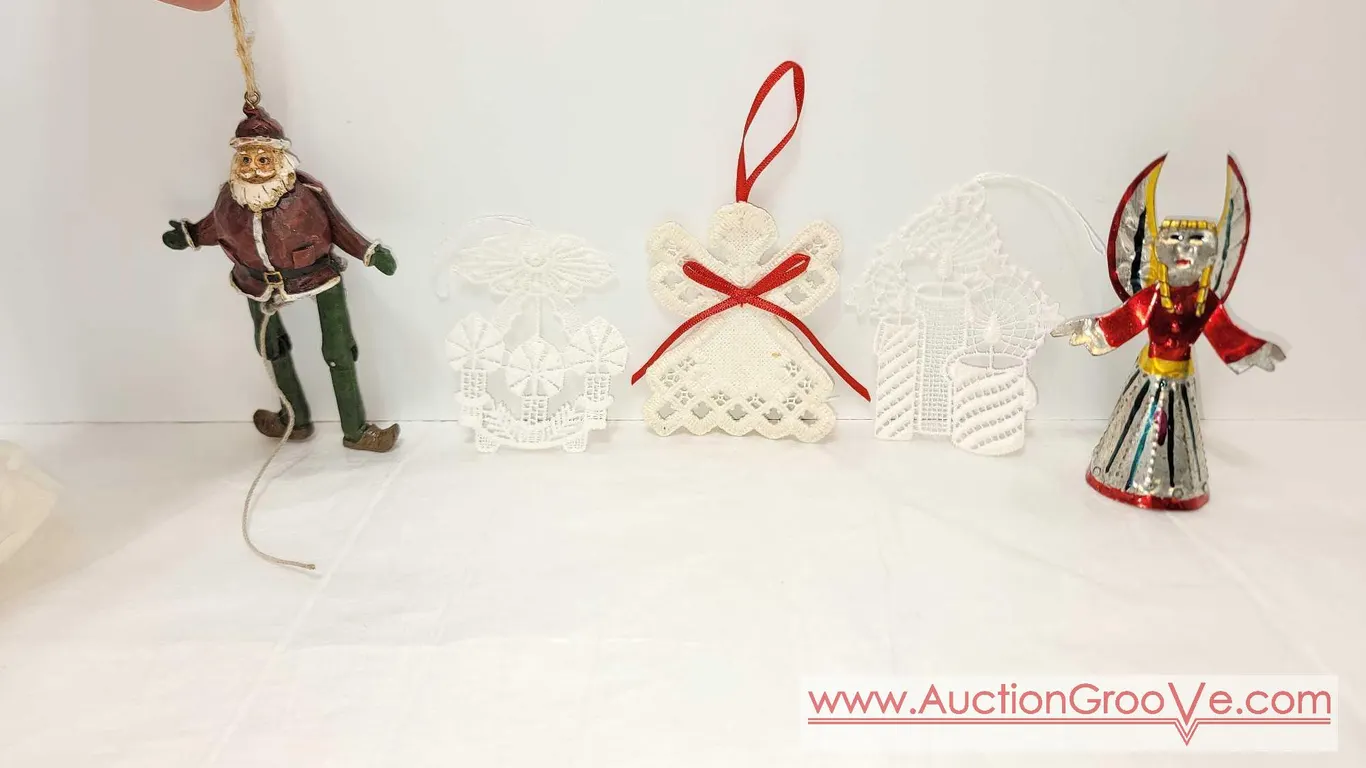 Dancing Santa when you pull the string his legs jump about plus three Belgian lace ornaments and painted tin ornament. BCB