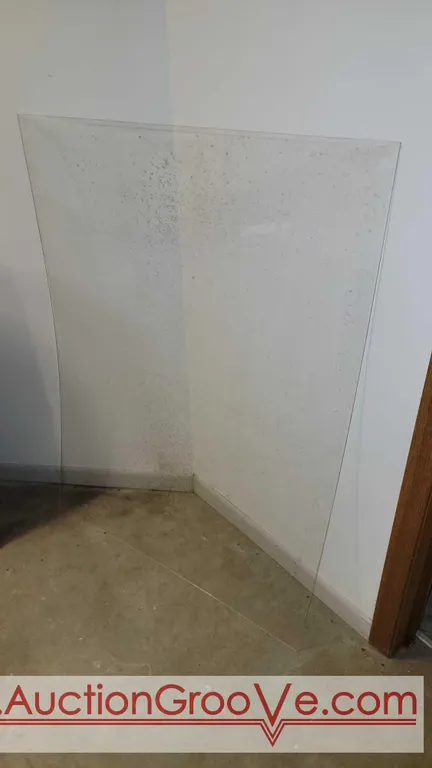 Plexiglass. Three pieces 32" x 42" plus 1 on a frame and a few smaller pieces. The 3 appear to be dusty but unused. Located in basement bring