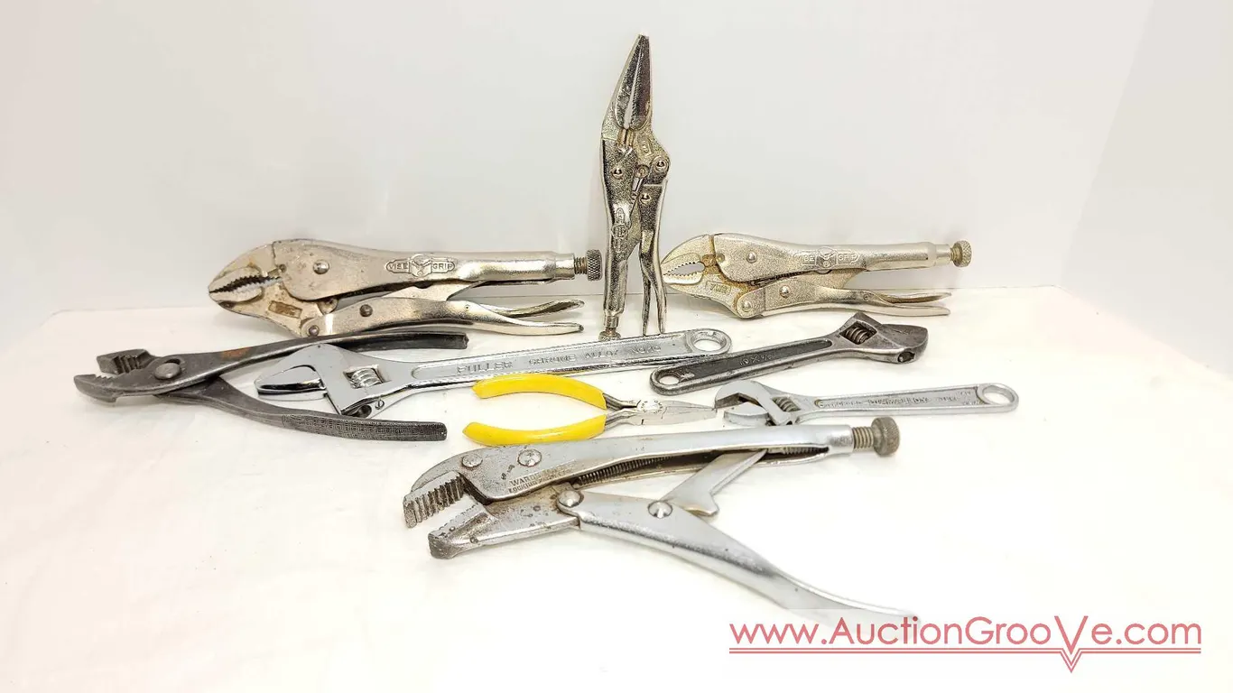 3 - Vise Grips, 3 - Crescent Wrenches, 1 pair of Jeweler's Pliers, 1 regular pliers, and a Ward's Master Locking Plier. BW