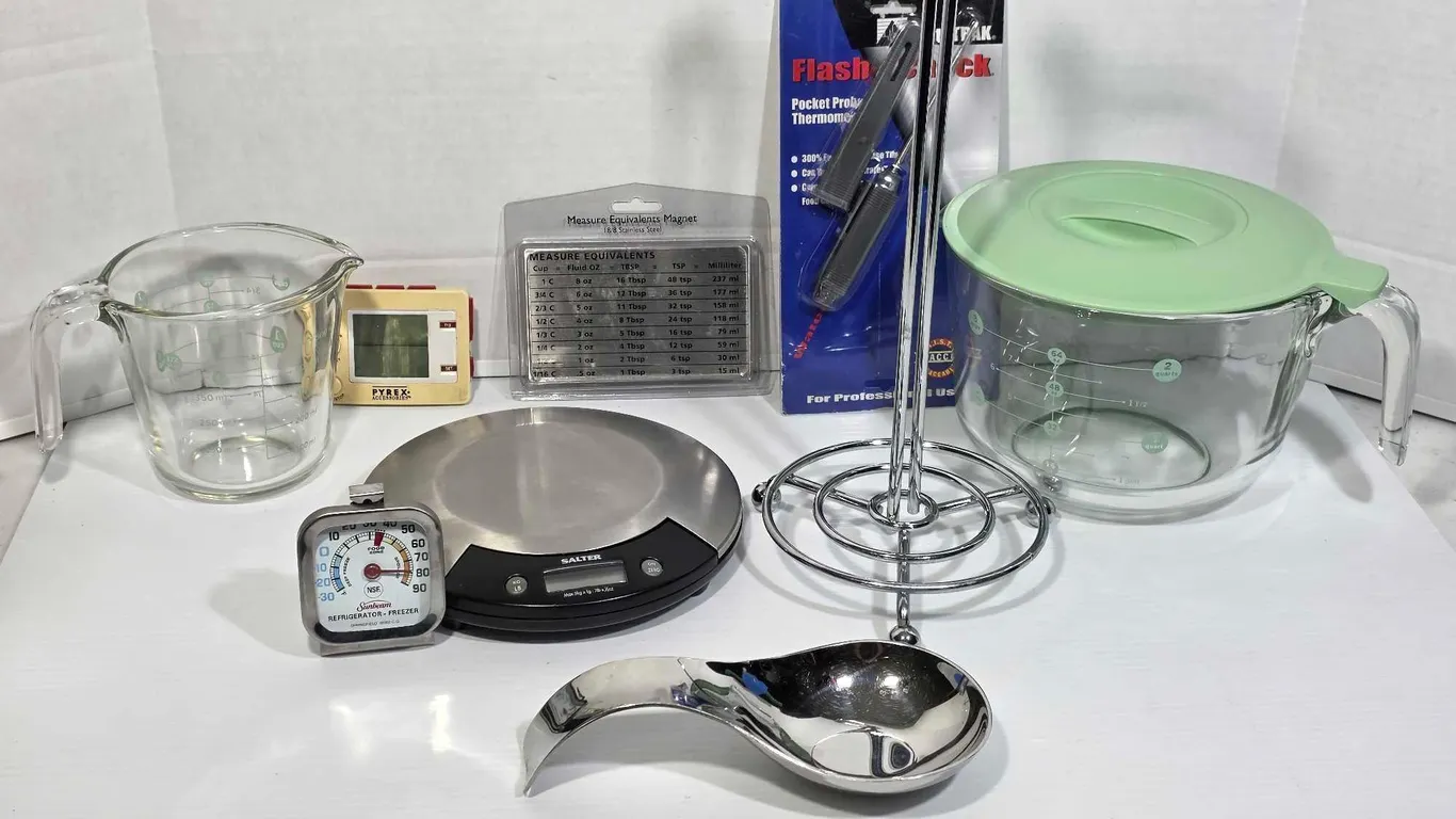 Kitchen Essentials. Scale, measuring Cups, Paper Towel Holder, Spoon Rest,and More. K