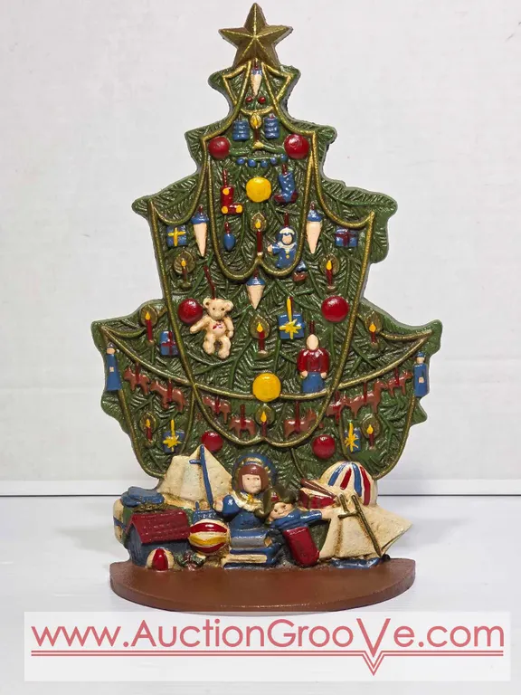 Vintage Midwest Imports Cast Iron Christmas Tree Door Stop. 7 x 3 x 11. K