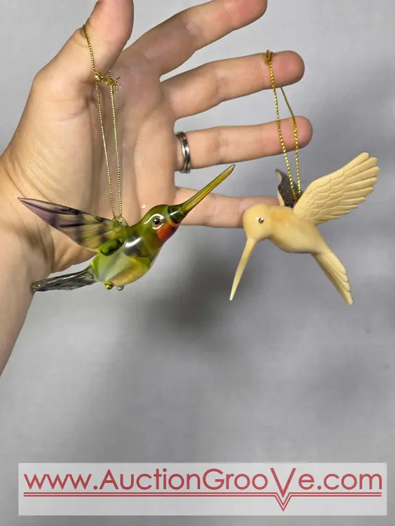 Decorative Humming Birds. Hand Carved Taga Nut, and Glass.