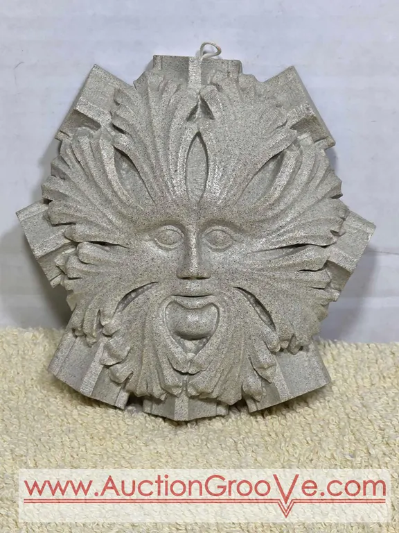 The Green Man Reproduction. Contains stone removed from Centerbury Cathedral during restoration work. 4 x 4 x 1. LR