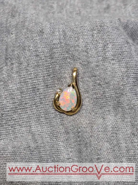 14K Gold Opal and Diamond Pendant. 1.5g. JB