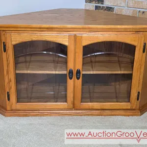 Corner Cabinet Entertainment Center. 47 x 26 x 24. *you must bring adequate help to remove and load. Located on main floor. LR