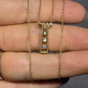14K Gold 14" Necklace and and Pendant. 2.5g Tests as diamonds. JB