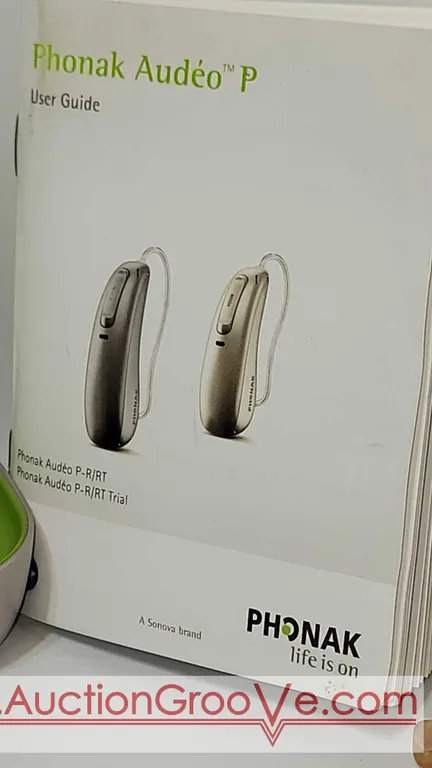PHONAK AUDEO P Hearing Aids. I plugged them in charged them up and they seem to work. Includes Charging Case, Charger with cable, Instruction Manual a