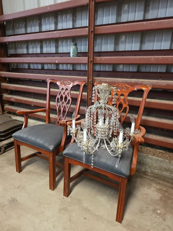 2 Wood arm chairs and chandelier