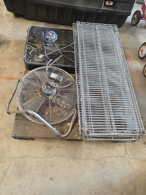 Pallet of steel shelving and fans