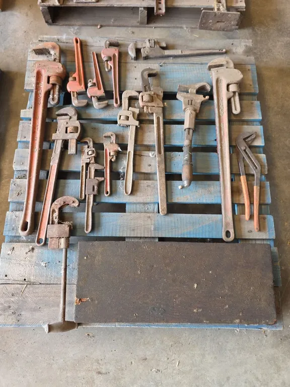 Pallet of pipe wrenches, chanel lock and tap and die