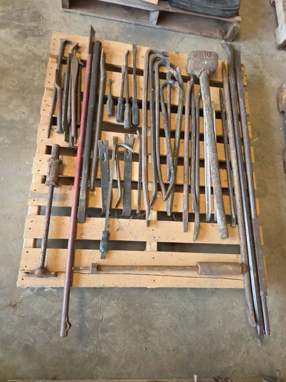 Large quantity of prybars, heavy bars, tire bars and mall