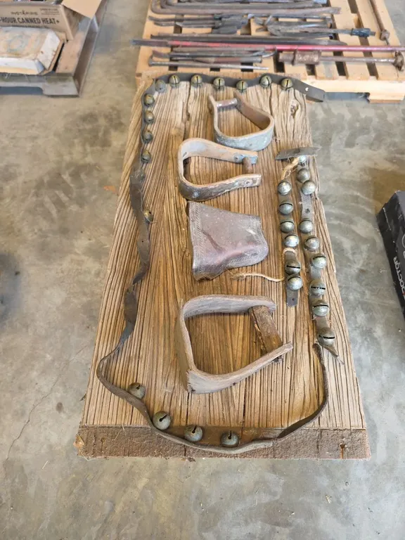 Rustic wood bench, stirrups and bells