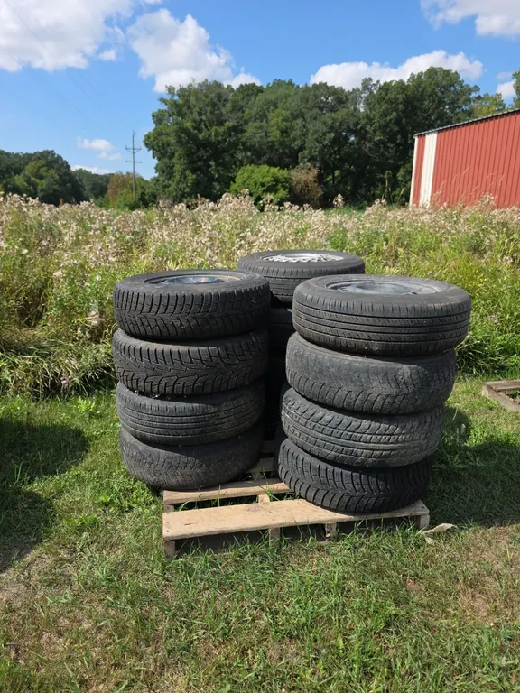 Qty 12 assorted car tires on rims mostly 15"