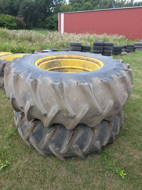 Pair of firestone 20.8-34 tires on jd band duals