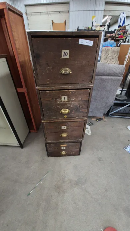 Stacked Wooden Filing Cabinet with Four Drawers, Brass Pulls, and Numbered Labels. 51”×24”×18”