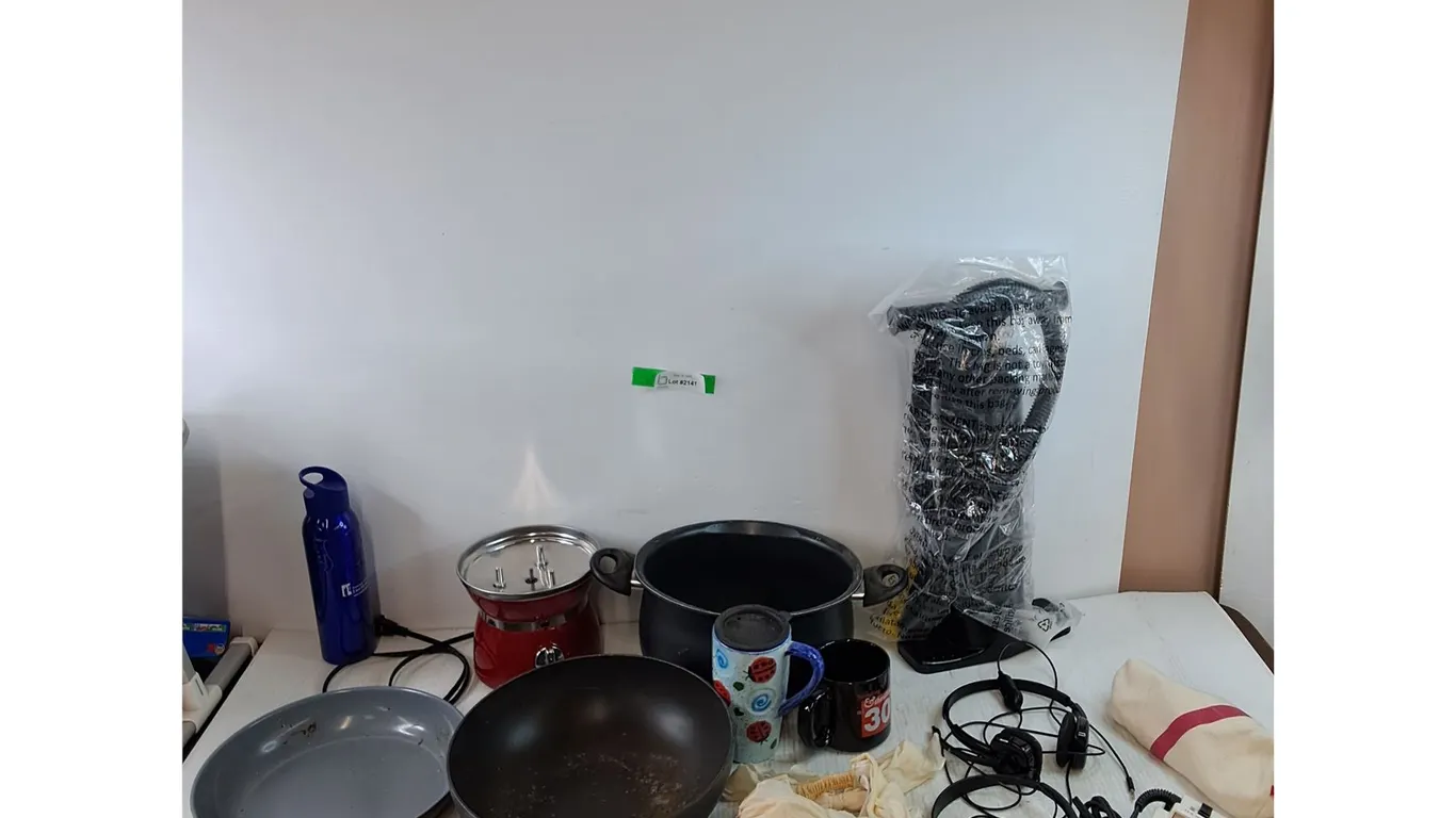 (2) Pans, (1) Pot, (2) Headsets Unyested, Sanyo Travel Butler, Air Pump, Water Bottle, Misc