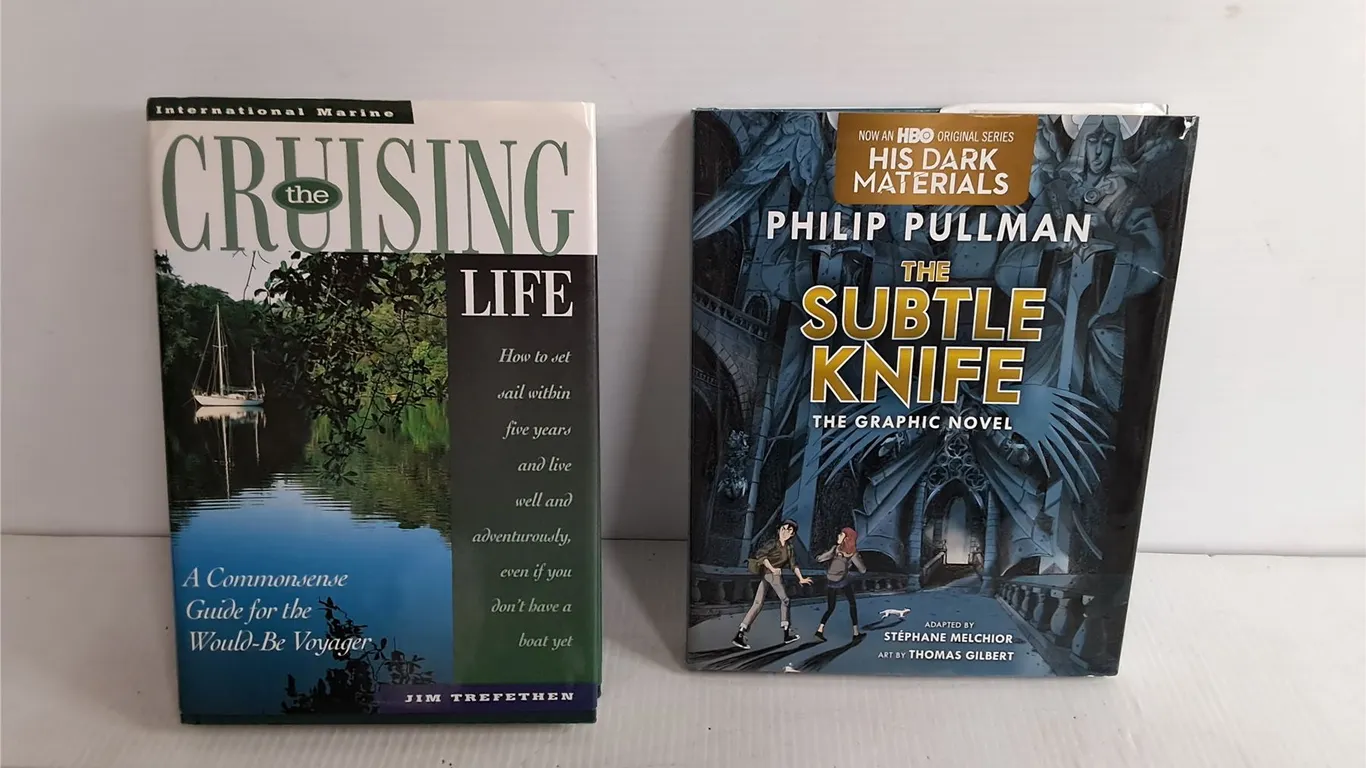 (2) Books- 'The Cruising Life' & 'The Subtle Knife' Graphic Novel