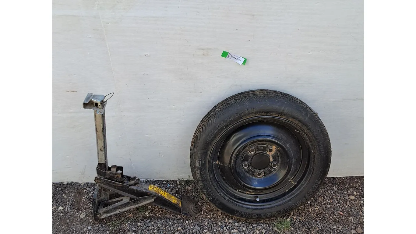 **Spare Tire T125/70D15 And Jack No Shipping