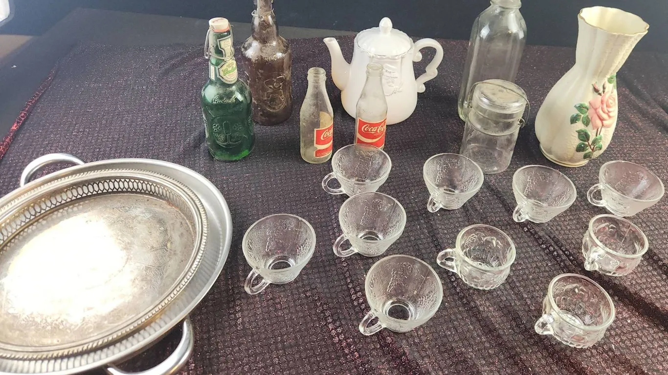 Glassware, Bottles, Teapot, Metal Trays, and Vase Lot