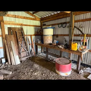 Ladder, Lumber, Barrels, Workbench, Tools