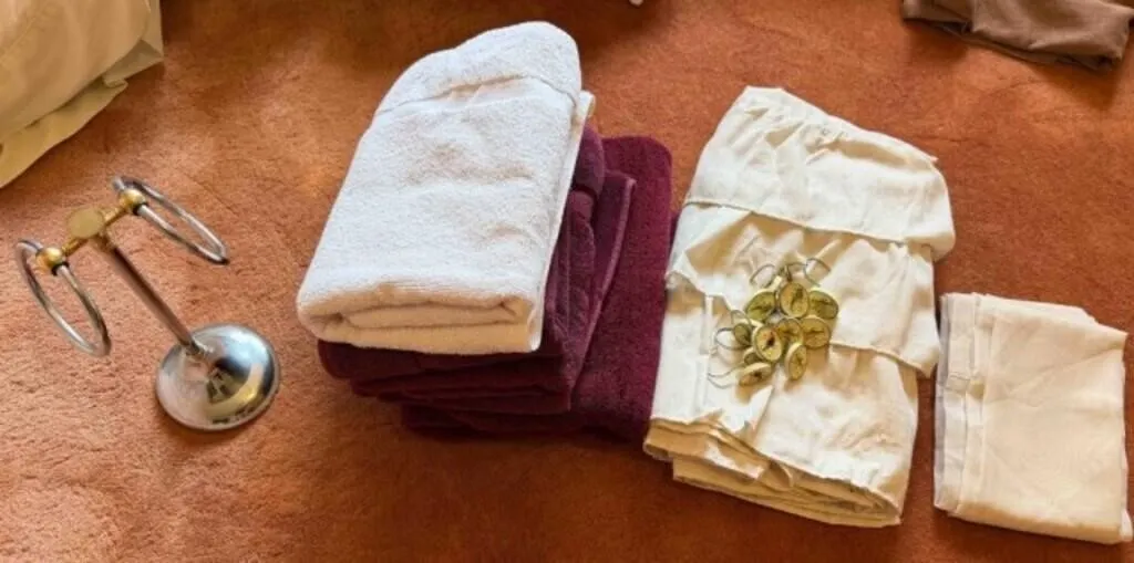 Shower curtain and hangers, towels, towel rack