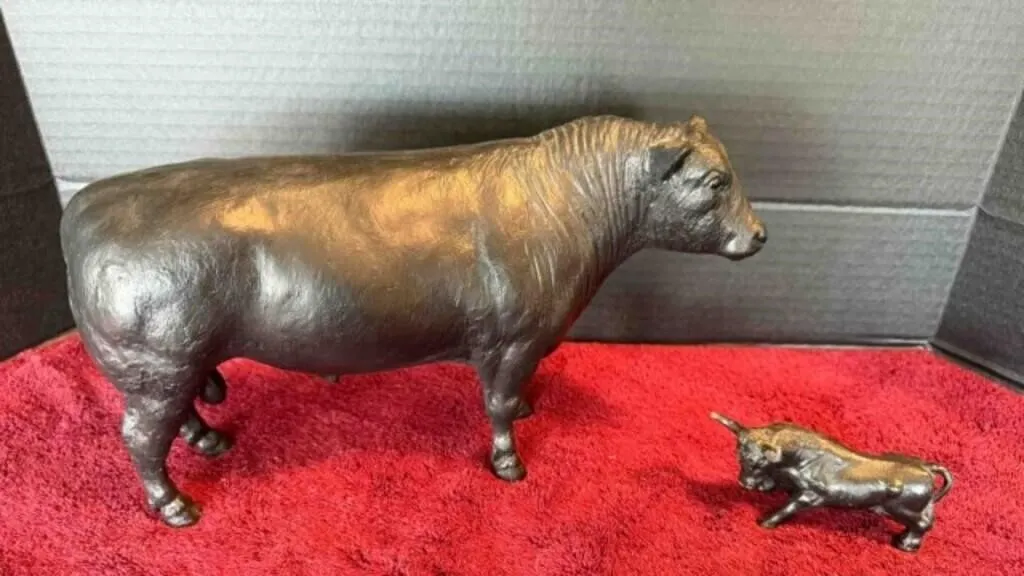 Plastic Bull, and Cast iron Bull Figure
