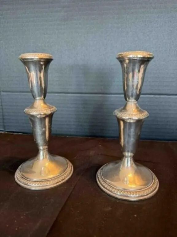 A pair of Sterling Silver-Plated Candle Sticks