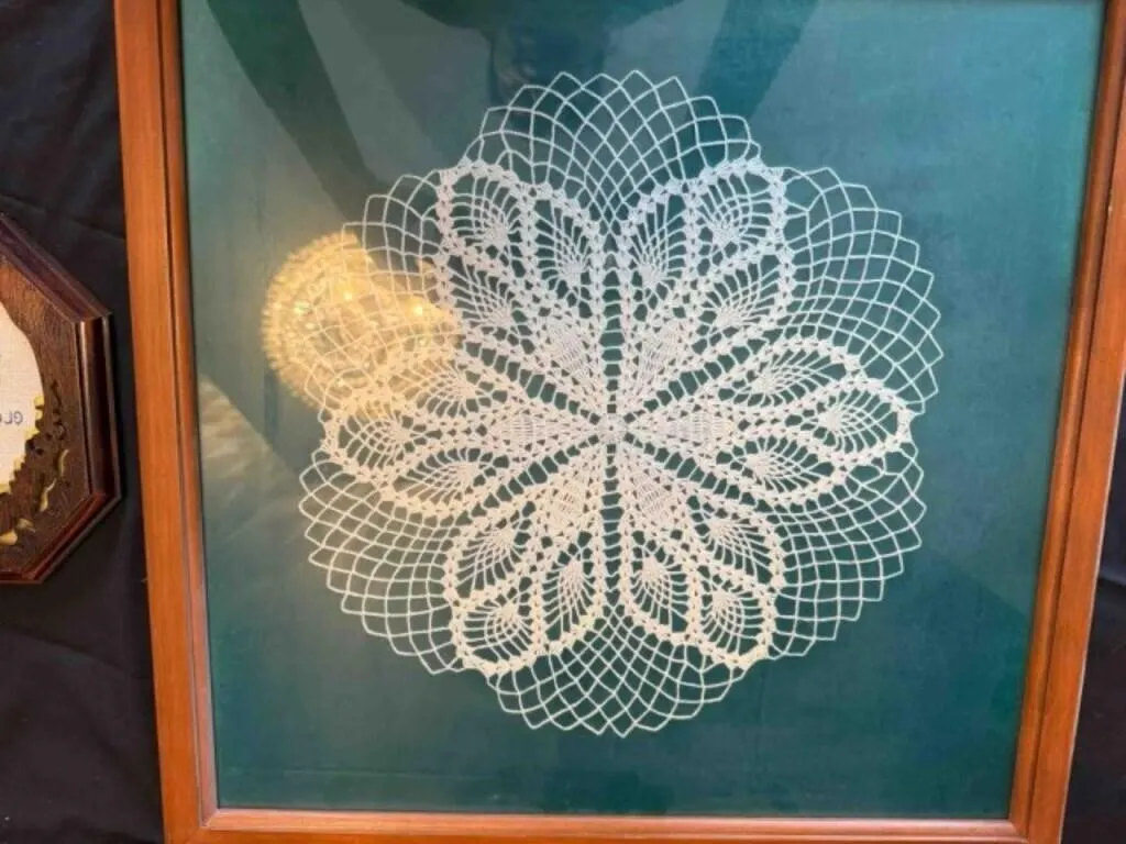Two Pictures: Framed Doily & Framed Cross-Stitch