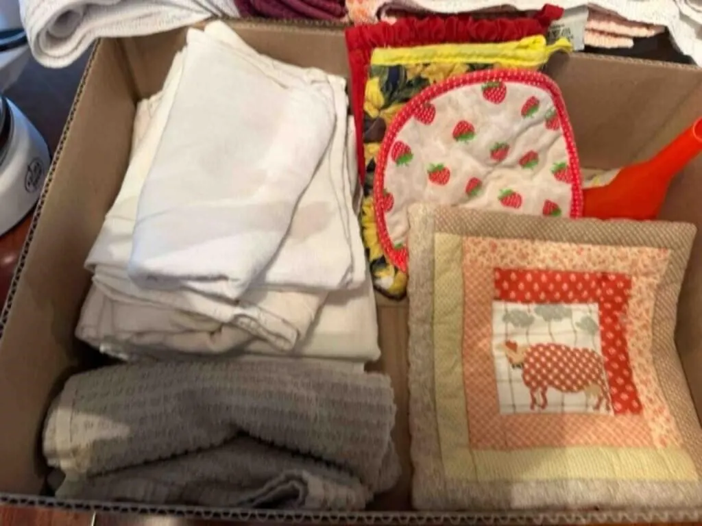 Kitchen towels, pot holders and Coffee pot