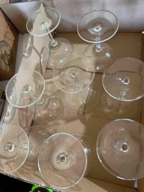 8 Clear glass stemmed wine glasses