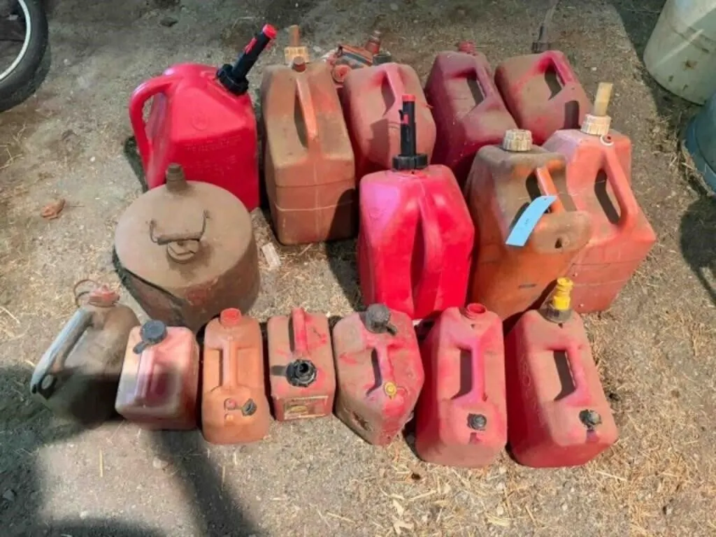 Assortment of plastic and metal fuel cans