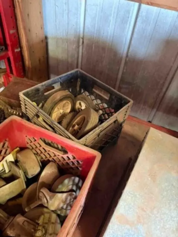 Shelf Contents: Misc. wheels, Blower, gas engine