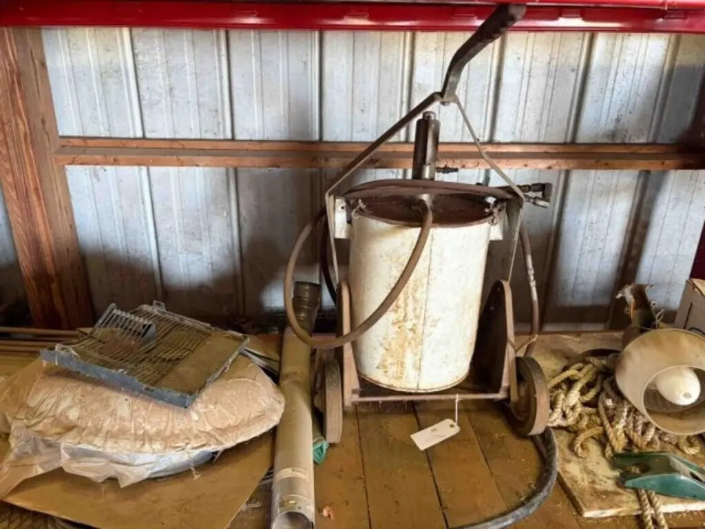 Shelf Contents: grease bucket, yard light, chairs