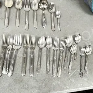 bundle of silver plated cutlery