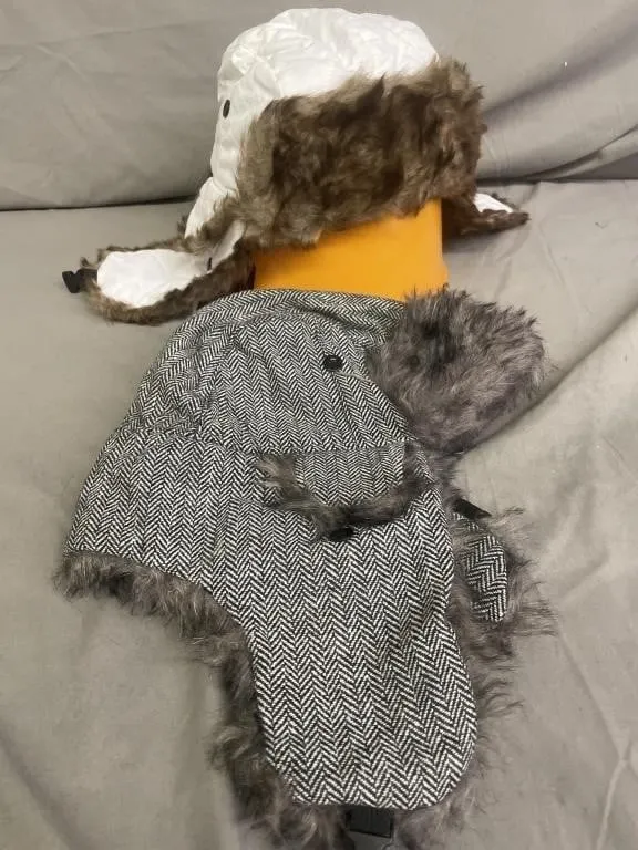 NEW � Two trapper-style winter hats with faux fur