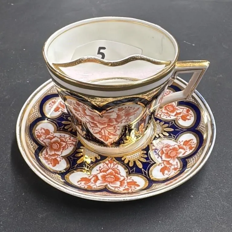 Antique Porcelain Teacup and Saucer Set